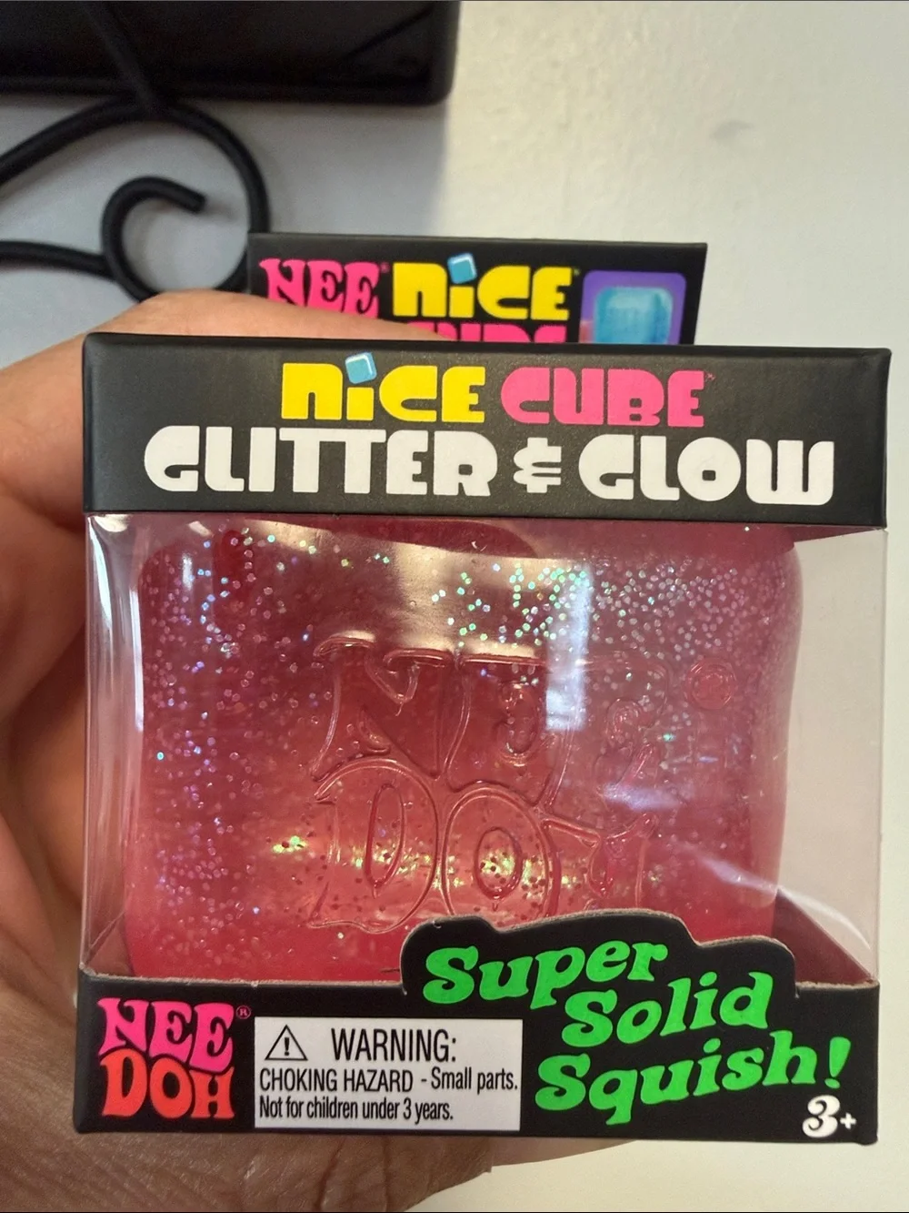 NeeDoh Nice Cube Glitter & Glow Pink Super Solid Squish Toy
